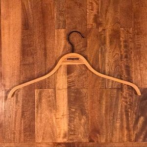 Two Patagonia wooden hangers